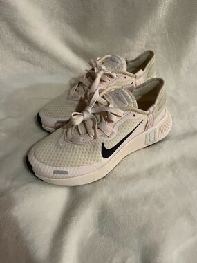 Nike Women’s Light Pink Trainer Sneakers with Black Swoosh
